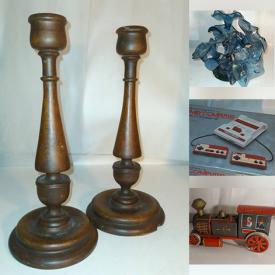 MaxSold Auction: This online auction features MCM teak display stand, beaded wall shelves, Lladro figurine, art glass, abstract sculptures, metal detector, wall masks, studio pottery, vintage quilts, slag glass hanging chandelier and much more!