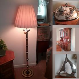 MaxSold Auction: This online auction features a dining room suite designed by Drake Smith @ Sons, Antique lamp, floor lamps, silver tea service, metal sailboat, Bassett sofa and armchairs and much more!