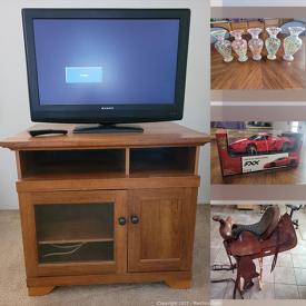 MaxSold Auction: This online auction features snow baby figurine, bobbleheads, kitchen table, vase, tv, oven, dresser, bookcase, desk nightstand, dishtowels, table tennis set, coin sorter, mirror sconce, western saddle and much more!