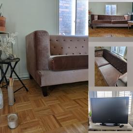 MaxSold Auction: This online auction features large couch & television.