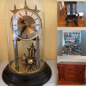 MaxSold Auction: This online auction features a buffet table, armoire, dresser with mirror, Captain\'s chair, game table and chairs, statues, Xbox, Asian figurines, floor lamps, Oars, bike rack, tools and much more!