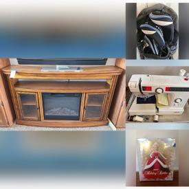 MaxSold Auction: This online auction features stereo components, entertainment stands, lift-top coffee table, reclining leather sofas, golf clubs, media center with fireplace, eagle figurines, leather coat, sewing machine, TVs, printers, CA king waterbed, fire pit and much more!