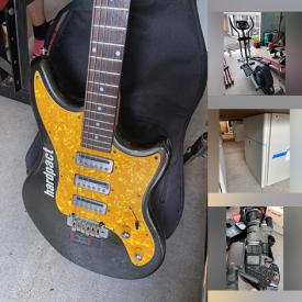 MaxSold Auction: This online auction features various items such as sewing machines, jack posts, router table, saw, vintage radios, gold balls, fan, strobe light, candle holders, silver plate, magazines, camcorders, projectors, guitar, bench, table frame, cabinet, massagers, books and much more.