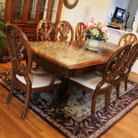 MaxSold Auction: This online auction features ornate granite and wood dining room table, Baroque style chairs, desk and china cabinet,  framed prints, lamps, vintage spun and cut glass wall mirror by Verti Murano, Modern swirl red vinyl accent chair and much more!