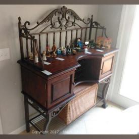 MaxSold Auction: This online auction features wrought iron and wood buffet, table and chairs, decor such as artwork, mirrors and lamps, recliners, sofa sleeper, antique desk, glassware, Soleus portable air conditioner, electronics and much more!