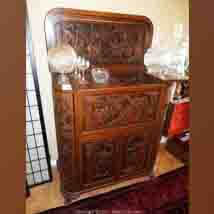 MaxSold Auction: This online auction features Asian themed furniture and decor: Two inlaid corner chairs, inlaid buffet, inlaid coffee table; an ornately carved bar and cocktail table with four pie shaped stools that slide underneath; a sofa bed; round metal topped table; a gun rack. Area rugs, a pickled wood kitchen table with tile inlay and matching bench. Crystal, sterling, Asian serving pieces. Asian ceramics and pottery. Noritake "Goldkin" and "Bluebell" china with a few pieces of Hertel Jacob/Bavaria in the mix. A Singer in cabinet sewing machine. A mink coat and jacket. Vintage collector's knives and much more!