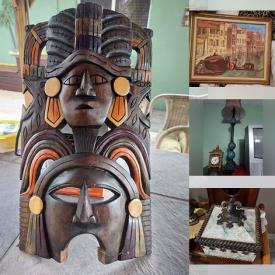 MaxSold Auction: This online auction features wooden tiki masks, iron fencing, bubble lamp, wooden wall clocks, recline chair, decorative boxes, framed wall art and much more!