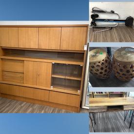 MaxSold Auction: This online auction includes furniture such as a rattan sofa, shelving units, desk, carts, bamboo table, hall table, wicker desk, rattan plant stands, dining table, TV stand, chairs, cabinets, wall unit and others, cushions, wall art, rowing machine, kitchenware, lamps, books, vases, canisters, Avenger comics and much more!