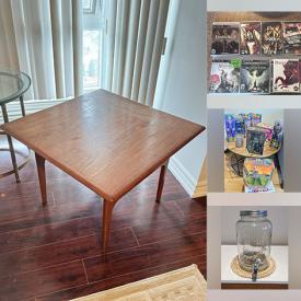 MaxSold Auction: This online auction includes MCM coffee table, small kitchen appliances, signed Robert Munsch books, PS3 and PSP games, lighting, action figures, headboard, dishware, lamps and more!