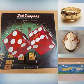 MaxSold Auction: This online auction included jewelry, accessories, vinyl records, rug, kitchenware, brassware, retro TV tables, vases, cabinets, hanging light fixture, DVDs, bottles, metal flower frogs, magazines, decor, vintage games and more!