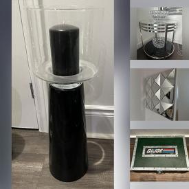 MaxSold Auction: This online auction includes DVD box sets, crystalware, designer home decor, glass side table and more!