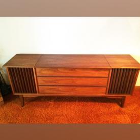 MaxSold Auction: This online auction features FURNITURE: Mid-century - sofa, chairs, end tables, buffet, hi fi, Danish teak; bookcases. ART: Watercolor by Reggio-Hafen; masks and plaques; signed art; carved art; a tapestry. VINTAGE: 1970's nightgowns; fondue set; pottery; Singer sewing machine; dollhouse; linens. CHINA: German Konigliche pr Tettau; Arabia - made in Finland tea set. Bone handled carving set. COLLECTIBLE: Elephants. Decorative: Mid-century lamps, ceramics; oriental rugs and much more!