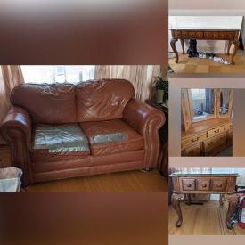 MaxSold Auction: This online auction features leather furniture, solid wood tables & hutch, solid wood dining table & chairs, solid wood dresser.