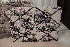 MaxSold Auction: Features decorative mirrors, flatware, trunks, artwork, upholstered chairs, wall clocks, bookshelves, hall table, decorative plates, garden pots, picture frames, pots and pans, rugs and pottery!