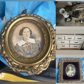 MaxSold Auction: This online auction includes wall art, loveseat, futon, bedframe, dresser, carvings, Tonka truck, pipe, books, silverware and more!