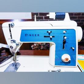 MaxSold Auction: This online auction features Metal And Wooden Bed Frames, Singer Sewing Machine, Milk Can, Stain-glass Wall Hanging, purses, Dresser, and much more!