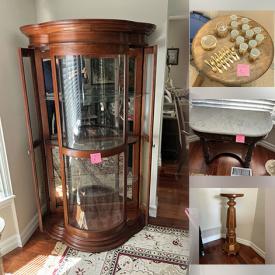 MaxSold Auction: This online auction features curio cabinets, sewing cabinet, leather chairs, alabaster statue, video games, humidor, sports memorabilia, exercise equipment, bookshelves, collector plates, and more!