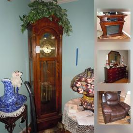 MaxSold Auction: This online auction features: Tiffany-style lamps; Howard Miller grandfather clock; cast iron doorstop collection; collectible plates; leather sofa and chair; Waterford crystal; Beatles and Elvis records; an Oreck vacuum; a TEAC vintage style stereo and much more!