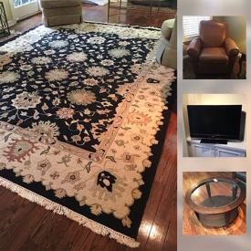MaxSold Auction: This online auction features dark wood coffee table, Heirloom Furniture love seat, full size brass bed, Sony 32” TV, large oriental rug, leather La-Z-Boy recliner, sleeper sofa, and much more!